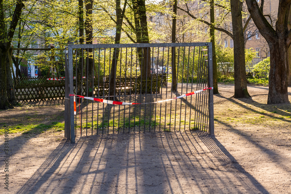 Metal football goal closed in a park because of Coronavirus