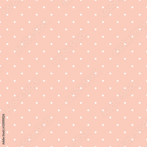 Polka dot seamless pattern on peach background. Great for scrapbooking textile, craft, invitations.