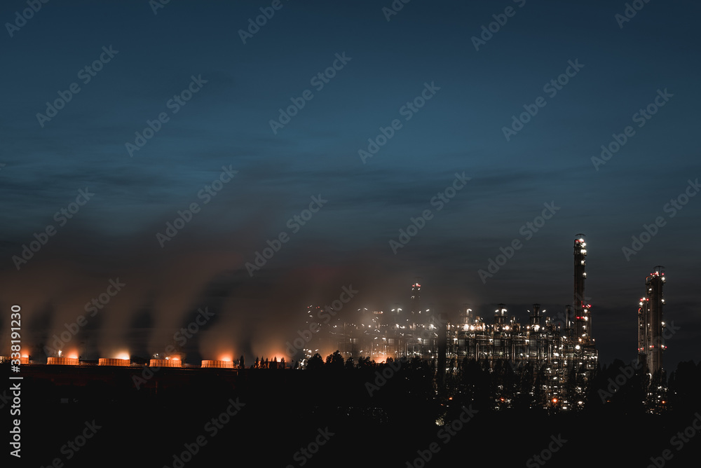 Long exposure image of Refineries oil plant Taken in the twilight,Thailand,Concepts of energy and environment,Oil Industry - refinery factory,copy space Long exposure image of Refineries oil plant Taken in the twilight,Thailand,Concepts of energy and environment,Oil Industry - refinery factory,copy space
