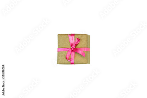 flat-lay of single present gift box with pink ribbon isolated on white background top view. Gift or present concept.