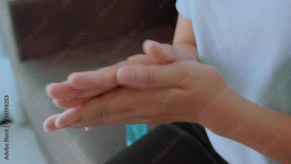 Woman hands using alcohol gel clean wash hand sanitizer anti virus bacteria Hygiene and Healthcare concept to Covid-19 virus prevention at Home Woman hands using alcohol gel clean wash hand sanitizer anti virus bacteria Hygiene and Healthcare concept to Covid-19 virus prevention at Home