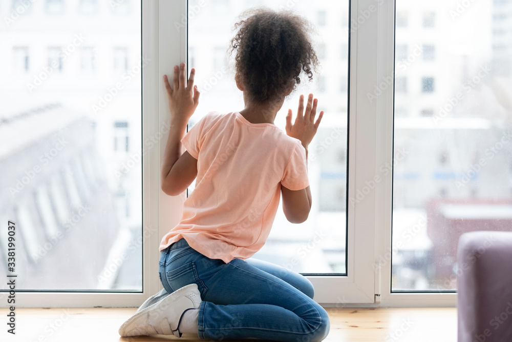 Window Alone Student Waiting african adolescent girl sitting alone on windowsill in living ...