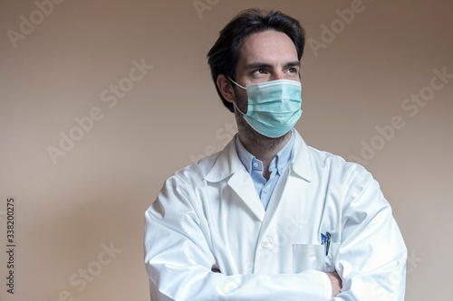 Male doctor wearing medical mask and gloves, preventive for corona virus