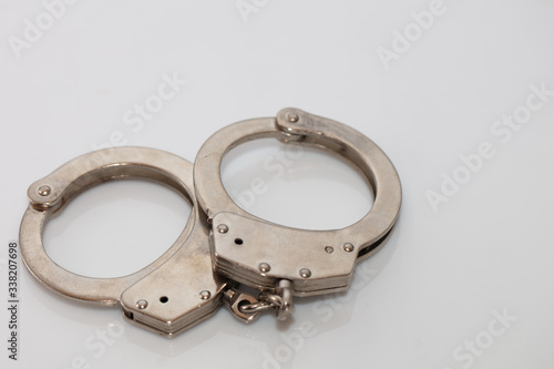 steel metal Handcuffs on white background isolate