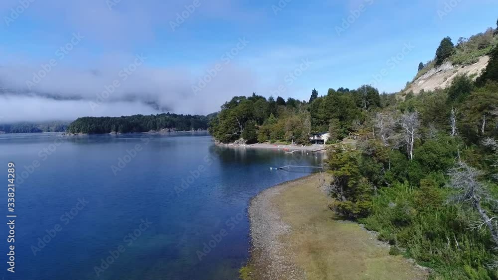 shot with drone over lake surrounded by mountains. shot with drone over lake surrounded by mountains.
