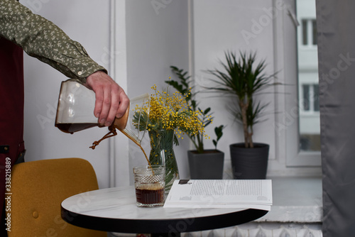 Alternating filter manual brewing of coffee close up. Devices for coffee in the background photo