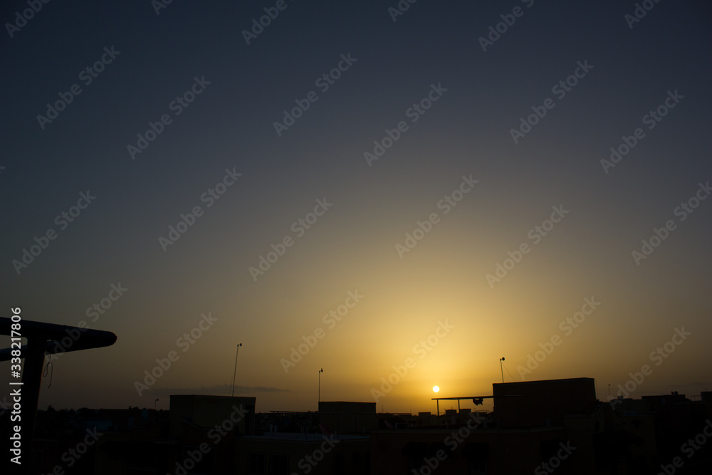 Obraz premium sunset over the city