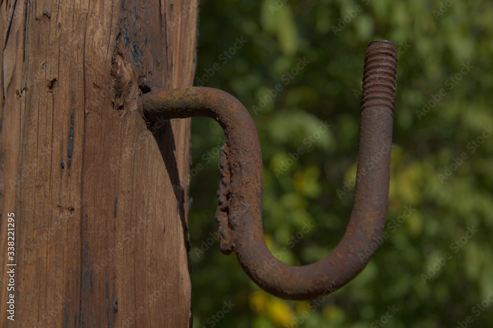 old wooden post
old rusty iron old wooden post
old rusty iron