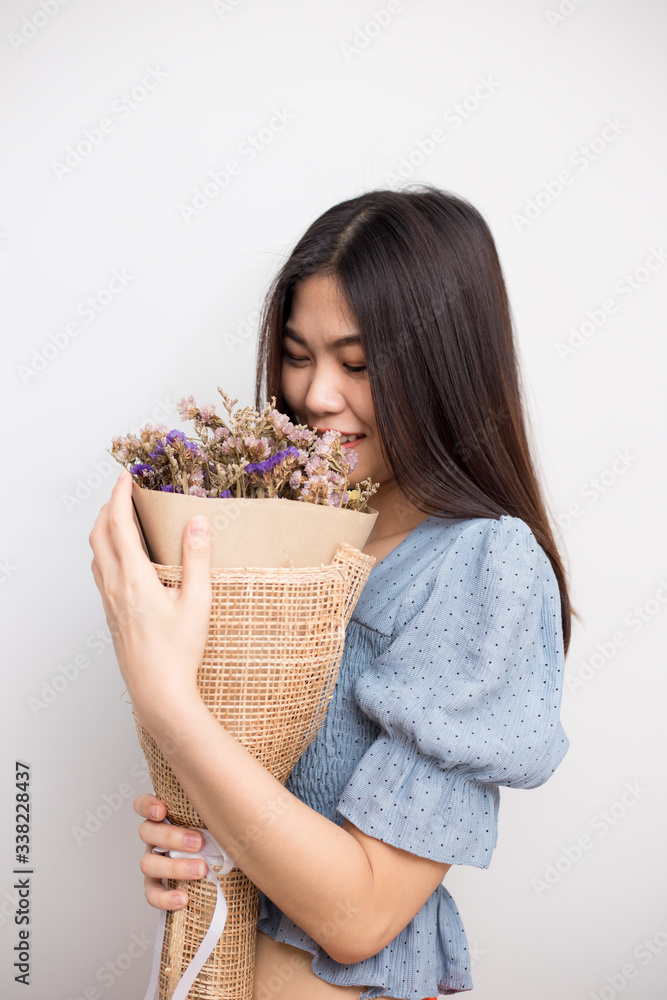 Beautiful sexy asian women hold bouquet dry flower Beautiful sexy asian women hold bouquet dry flower