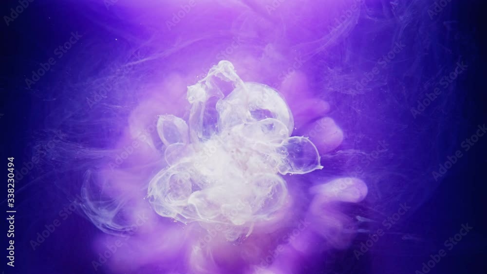 Paint water splash. Surreal spirit. White smoke cloud motion in galaxy blue fog. Paint water splash. Surreal spirit. White smoke cloud motion in galaxy blue fog.