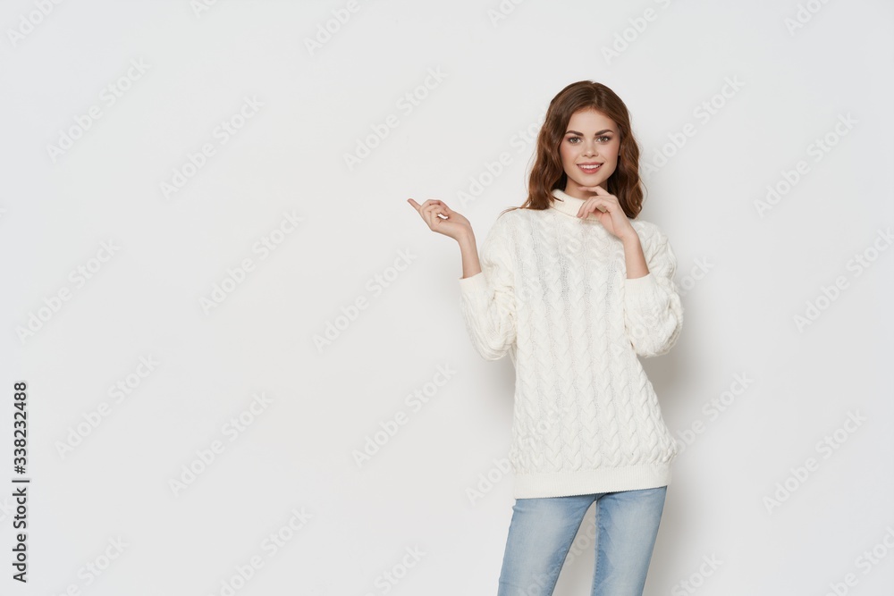 young woman pointing at something young woman pointing at something