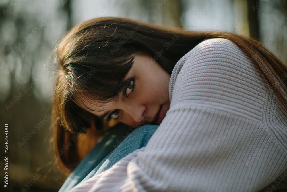 close up sensual portrait of young brunette female outdoor