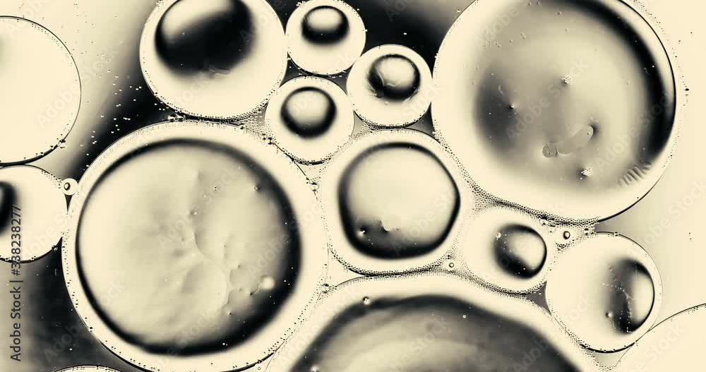 Movement oxygen bubbles in a liquid. Beautiful structure of water in macro a natural background Movement oxygen bubbles in a liquid. Beautiful structure of water in macro a natural background