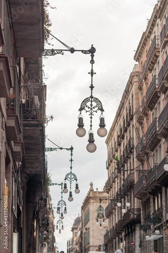 Canvas Print Openwork street lights that adorn a city street