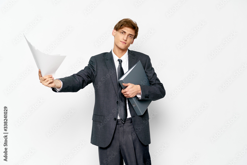 young businessman with a folder young businessman with a folder