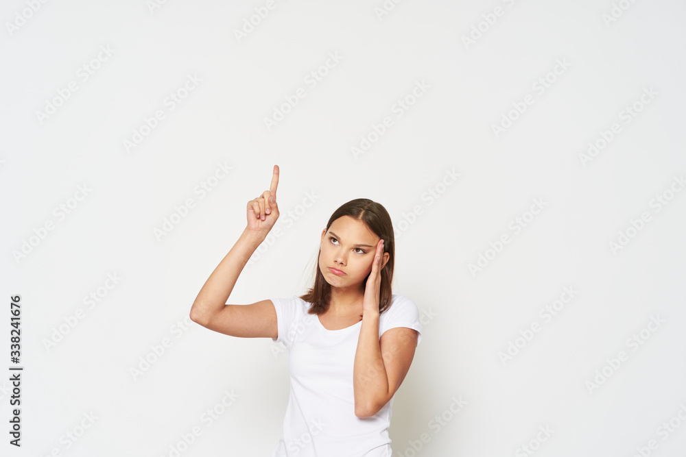 young woman pointing at something