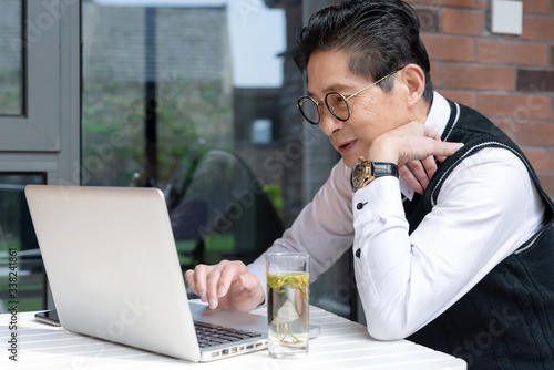 An Asian male wearing photo