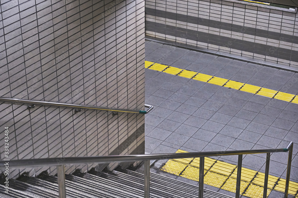 Obraz premium Escalator Detail with Yellow Safety Line, Urban Transit Texture