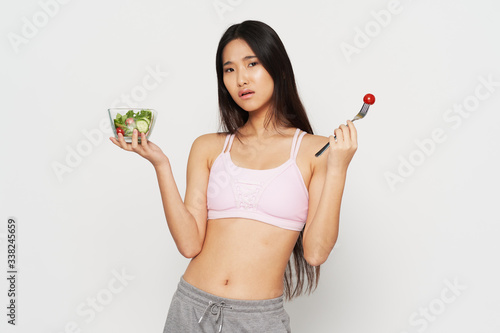 young woman holding a green apple © SHOTPRIME STUDIO