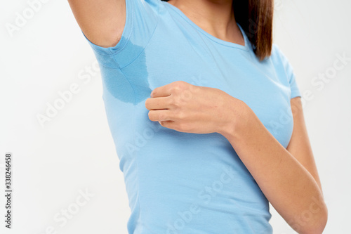 young woman showing thumbs up sign