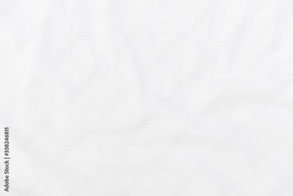 Fototapeta premium Abstract white fabric texture background. Wavy white cloth.