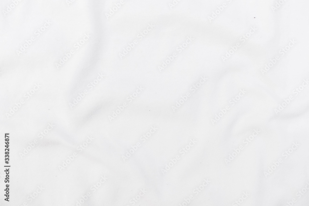 Abstract white fabric texture background. Wavy white cloth.