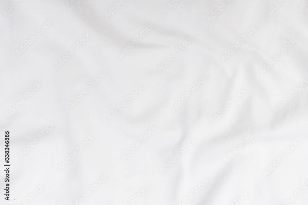 Abstract white fabric texture background. Wavy white cloth.