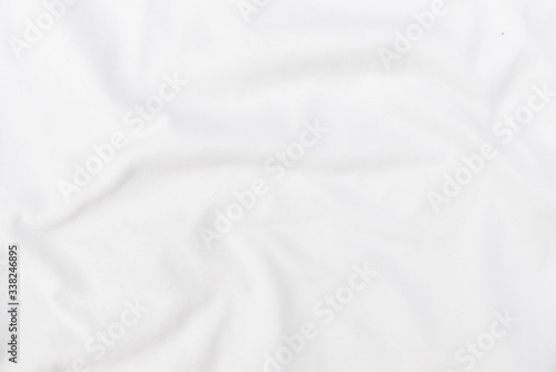 Abstract white fabric texture background. Wavy white cloth.