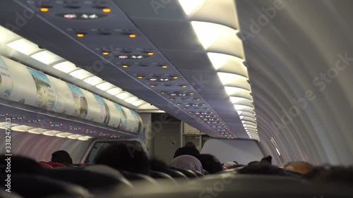 passenger seat, people in the Airplane, airplanes interior view, Interior of passengers airplane with people on seats, aircraft cabin, Passengers sit in their seats, Travel concept