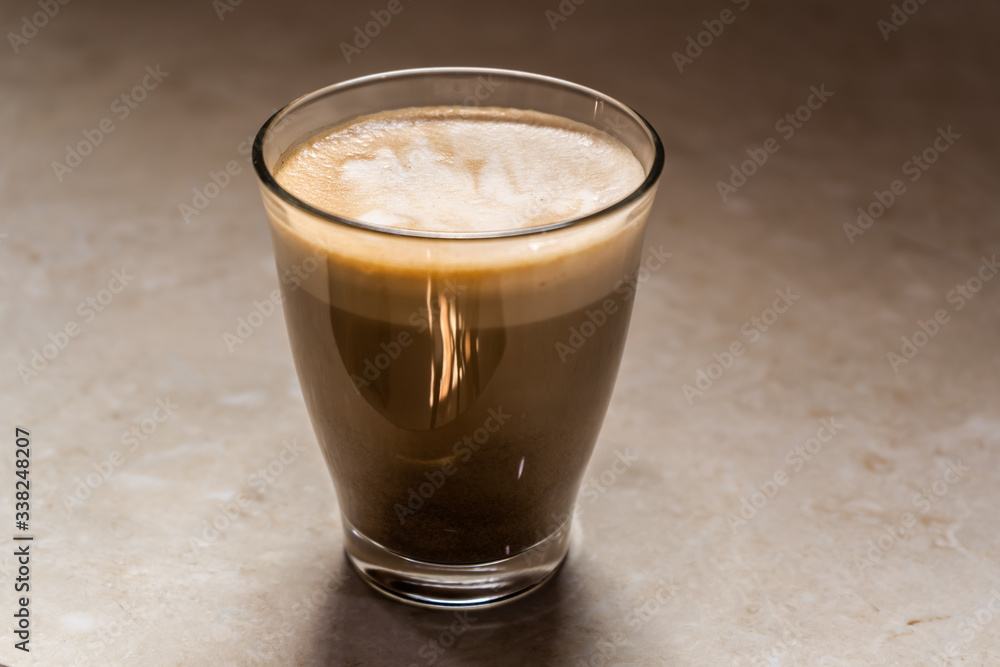 A glass of Cappuccino coffee A glass of Cappuccino coffee