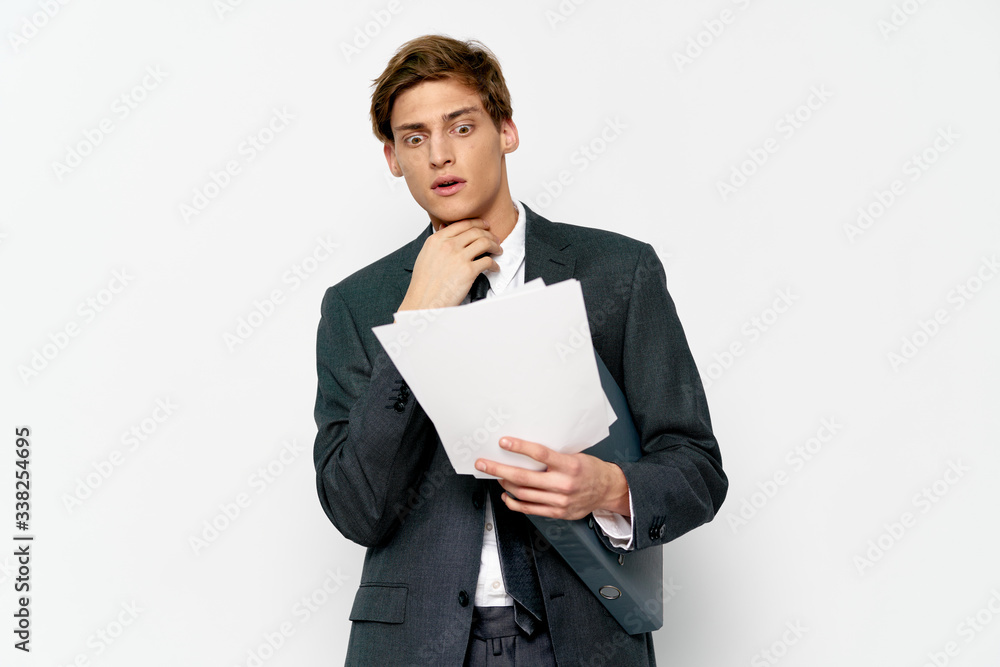 businessman holding a blank business card businessman holding a blank business card