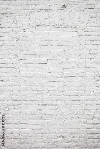 White brick wall and arch
