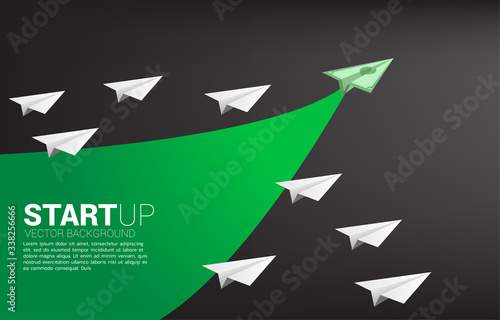 money banknote origami paper airplane is move faster than group of white. Business Concept of fast lane for moving and marketing
