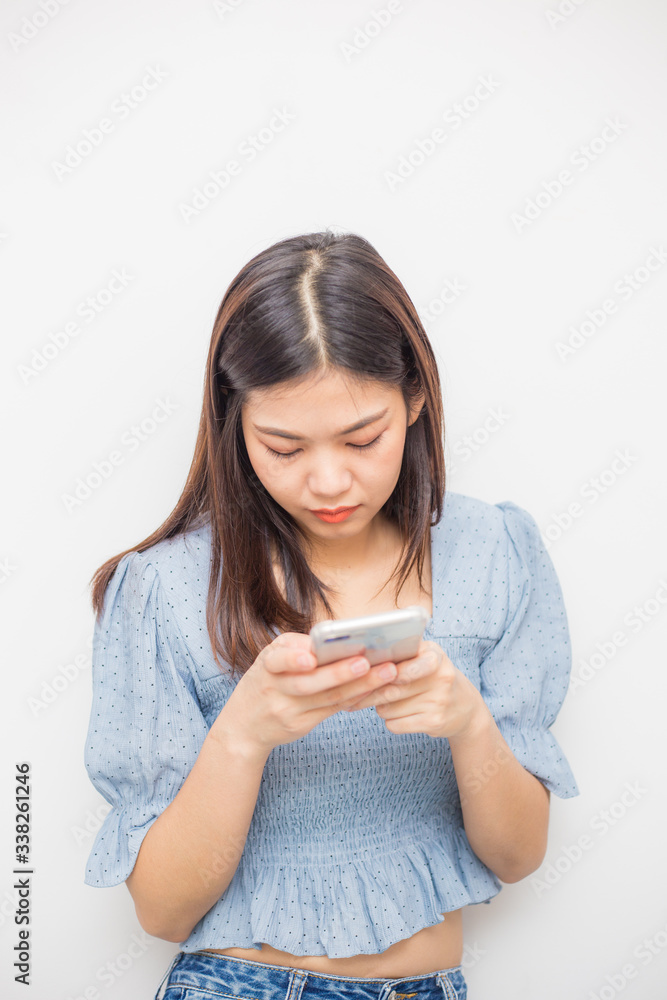 Pretty young asian women texting smartphone message online connection Pretty young asian women texting smartphone message online connection