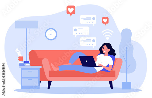 Beautiful woman relaxing at sofa with laptop computer flat vector illustration. Young girl staying at home and chatting with friends via digital device. Digital technology and entertainment concept.