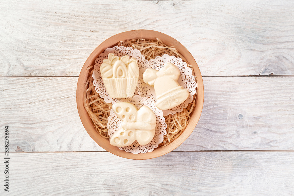 Fresh homemade butter in bowl, on wooden background. Top view. Rustic still-life Fresh homemade butter in bowl, on wooden background. Top view. Rustic still-life