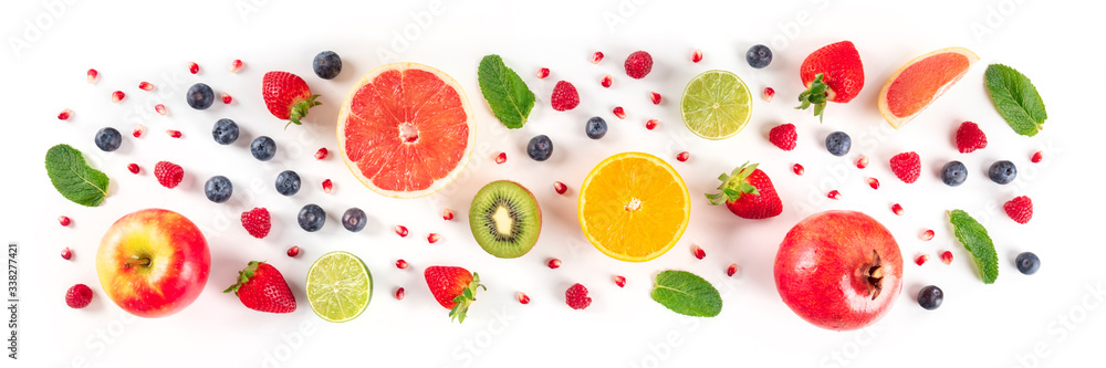 Fresh summer fruit panorama, a flat lay on a white background, vibrant food pattern, shot from the top Fresh summer fruit panorama, a flat lay on a white background, vibrant food pattern, shot from the top