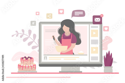 Cooking video blog on monitor display. Food blogger tells how to cook holiday cake.