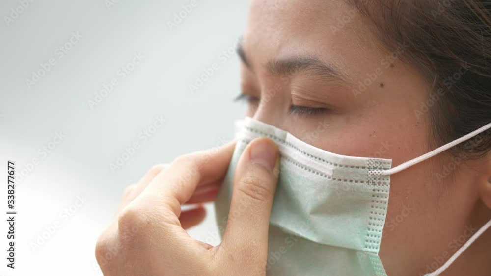 asian women wearing mask protect covid 19 corona virus pm 2.5 . healthcare concept. asian women wearing mask protect covid 19 corona virus pm 2.5 . healthcare concept.