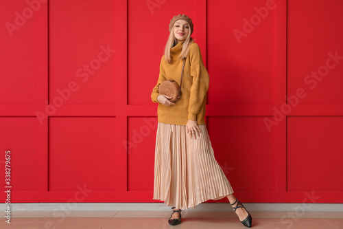 Young woman in warm sweater...