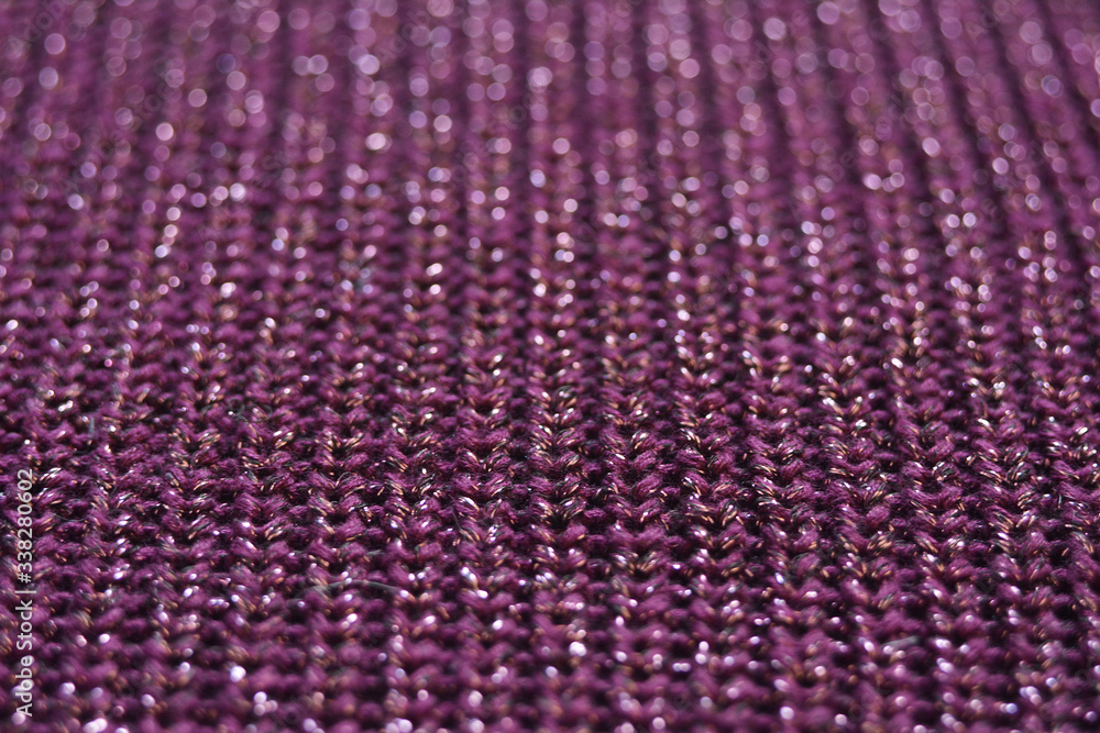 Violet texture for background. Knitted fabric cool plan. Beautiful purple bokeh. Violet texture for background. Knitted fabric cool plan. Beautiful purple bokeh.