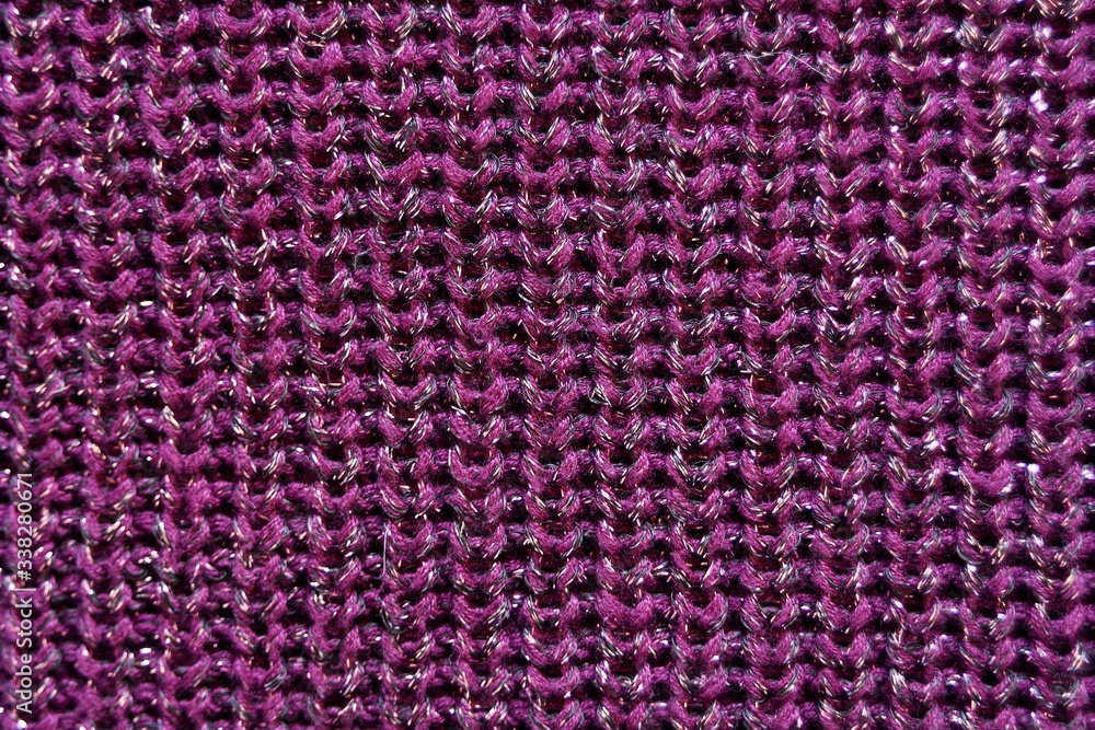 Violet texture for background. Knitted fabric cool plan. Beautiful purple bokeh. Violet texture for background. Knitted fabric cool plan. Beautiful purple bokeh.