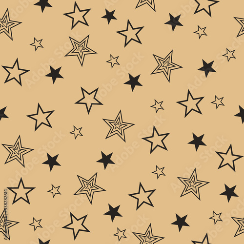 Seamless pattern with set drawn stars. Vector Wallpaper black stars on a beige background