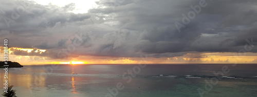 Sunset over the ocean on the Guam island