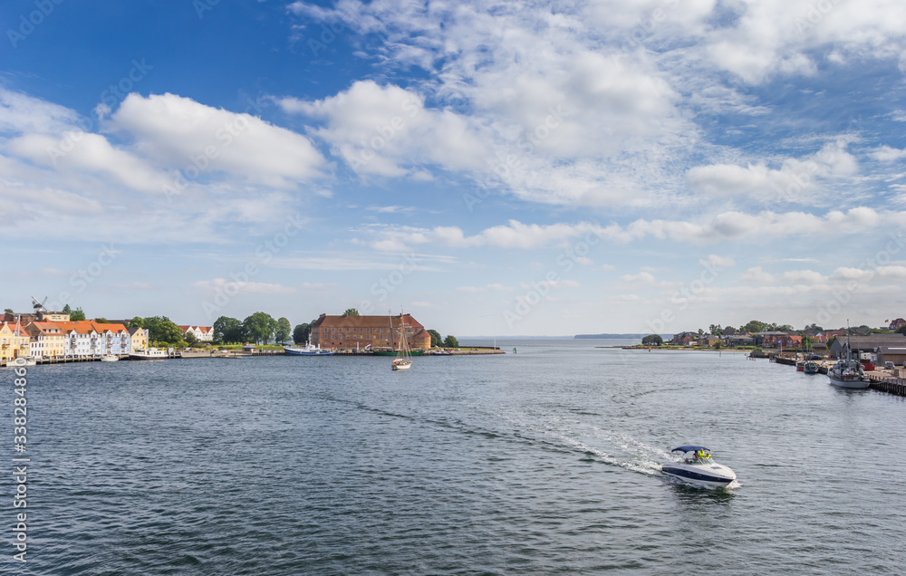 Motorboat in the harbor of historic city Sonderborg, Denmark