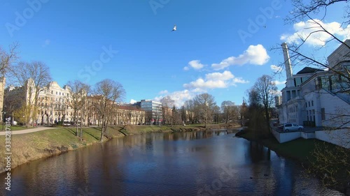 Timelapse Of National Opera and Ballet Beside Pilsetas Kanals. Riga, Latvia photo