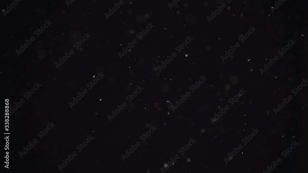 4k Natural Dust Organic Floating particles on black background. Dust in air atmosphere for your projects! Just drop it over your footage and use blending (screen) mode