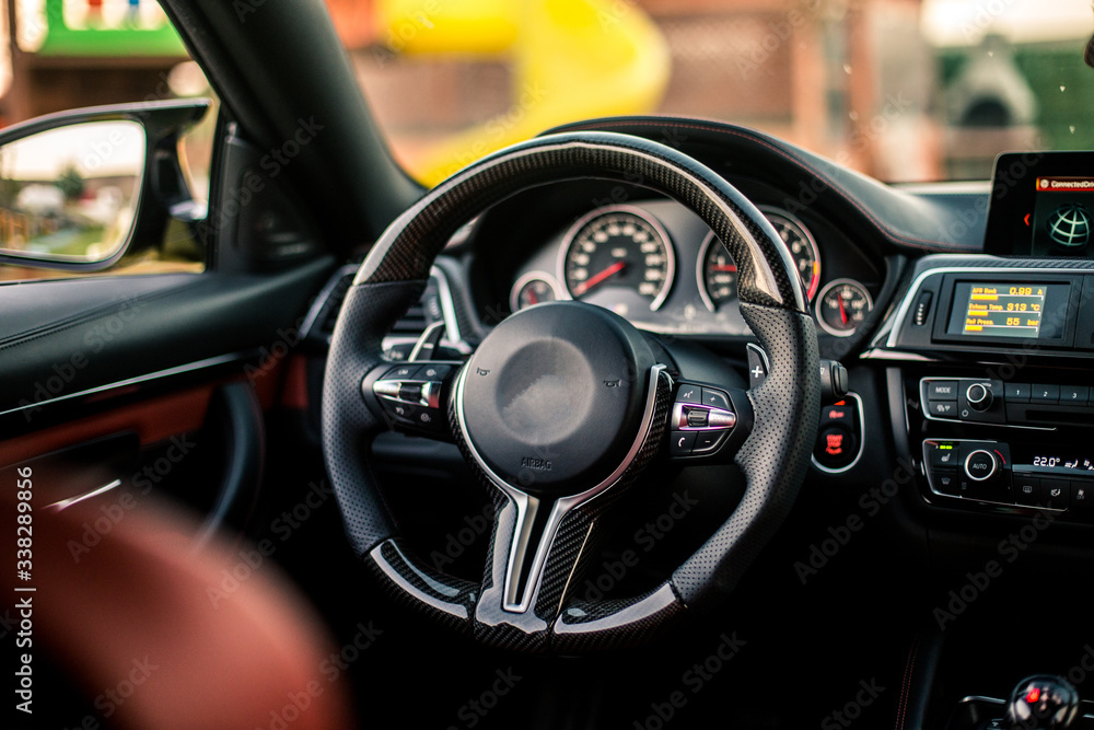 Black car interior, direction wheel