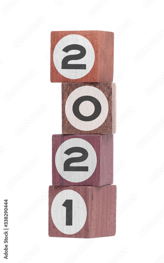 Four isolated hardwood toy blocks, saying 2021 Four isolated hardwood toy blocks, saying 2021