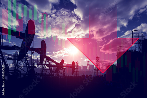 Oil production. Decrease in petroleum exports. Drop in petroleum companies' quotes.The decline in production of crude oil. The decline in oil prices. Silhouettes of oil pumps and tanks.